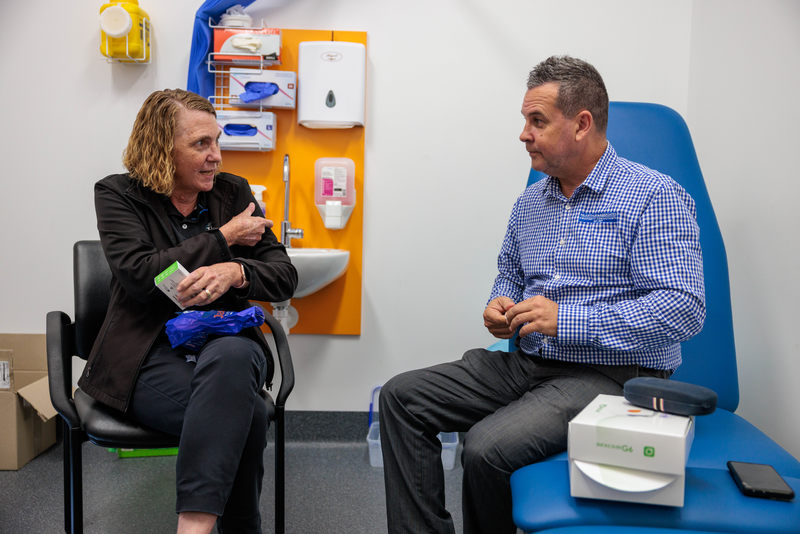 Image of a client and MATSICHS staff discussing diabetes education