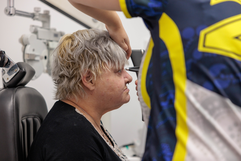 Image of MATSICHS Optometrist and client performing eye check