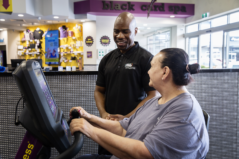 MATSICHS heart rehab staff and client in a gym